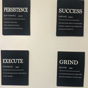 Black and white set of motivational canvas prints.